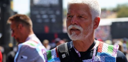 Insolite : un président de la République parmi les photographes de la F1
